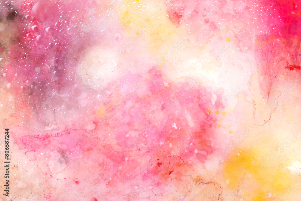 Abstract art with pink, red and yellow watercolour splashes and dots for creative background or wallpaper macro