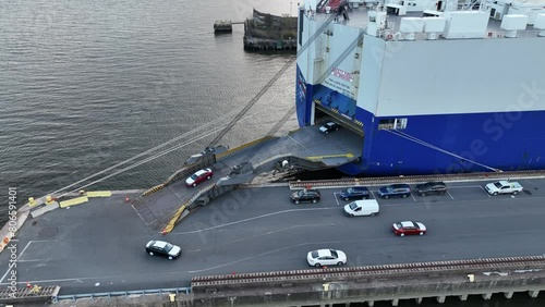 Aerial  View of New Cars Being Unloaded from Vehicle Car Carrier Ship