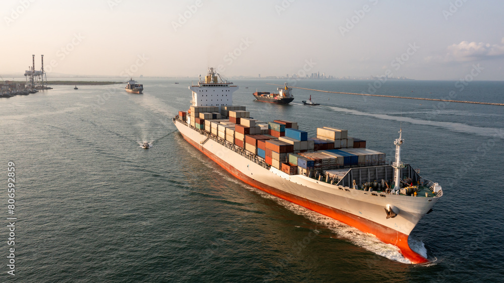 Aerial view container cargo ship maritime carrying container, Global business import export logistic freight shipping transportation international by container cargo ship, Container fright shipping. Aerial view container cargo ship maritime carrying container, Global business import export logistic freight shipping transportation international by container cargo ship, Container fright shipping.