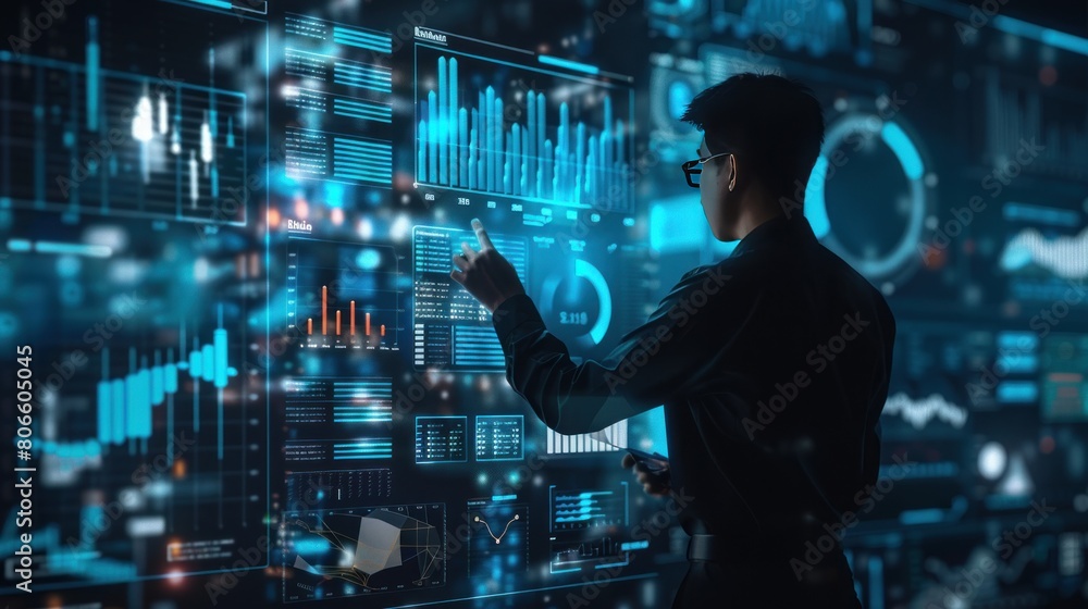 someone who is evaluating graphic data on a screen someone who is evaluating graphic data on a screen