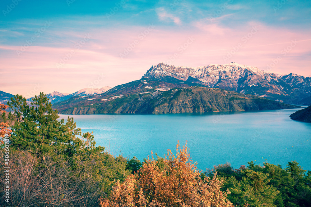 Fototapeta premium Mountain lake in autumn Aerial view. Serre-Poncon mountain lake in winter in Hautes Alpes, France