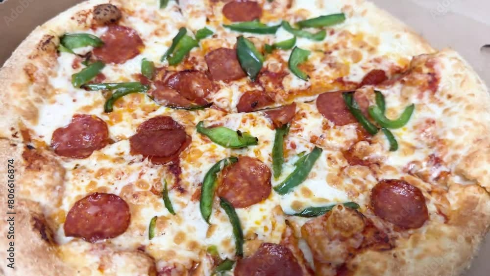 delicious, appetizing pizza with sausage, tomatoes and cheese
delicious, appetizing pizza with sausage, tomatoes and cheese