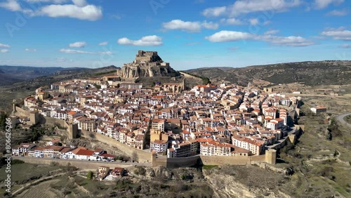 4k aerial video of Morella, Alicante, Spain. Hilltop village surrounded by wall with a castel in top of the hill. Medieval city and famous travel destination. photo