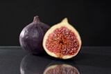 Fresh ripe figs on a dark background