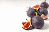 Fresh ripe figs on a white background