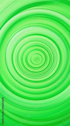 Green thin concentric rings or circles fading out background wallpaper banner flat lay top view from above on white background with copy space blank 