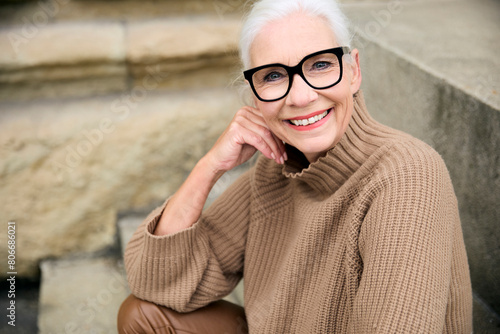 Happy senior woman with white hair photo