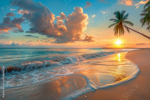 Vibrant sunrise over ocean waves on sandy beach