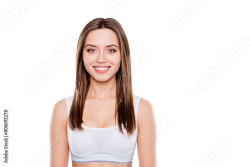 Portrait with copy space of nice toothy woman with perfect face skin natural makeup looking at camera isolated over white background. Wellness wellbeing perfection purity concept © deagreez