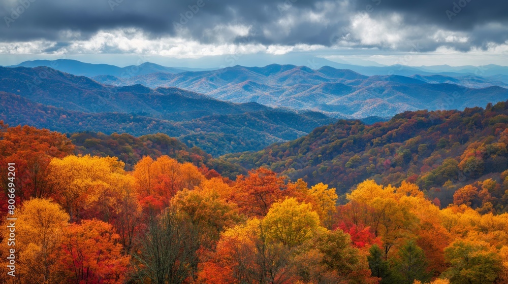 Vibrant autumn colors light up a majestic mountain range under a dramatic sky Vibrant autumn colors light up a majestic mountain range under a dramatic sky