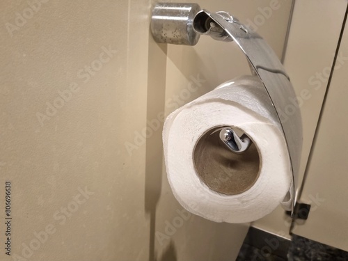 Close-up of toilet paper roll in bathroom