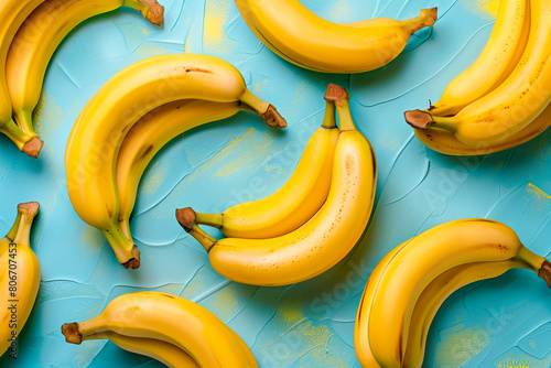 Fresh yellow bananas on bold colored blue background