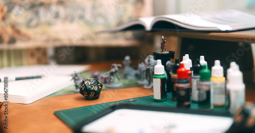 Brush paint acrylic colour to miniatures for tabletop role playing game or board games photo