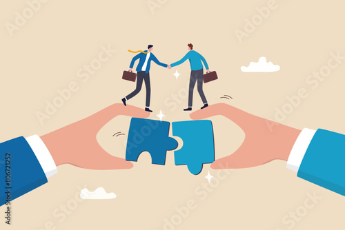 Partnership, teamwork or collaboration to success, solve jigsaw puzzle together, agreement or solution to win corporate trust, cooperation concept, businessman handshake connect jigsaw together.