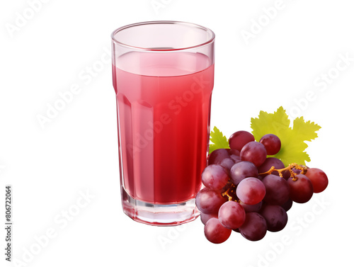 a glass of red juice next to a bunch of grapes