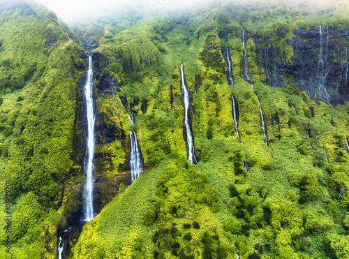 Green waterfall tropical landscape - Ribeira do Ferreira, green paradise hidden in Flores Island, Azores, Portugal, Pozo da Alagoinha photo
