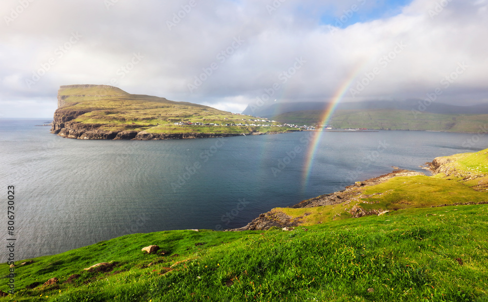 Faroe Islands landscape with rainbow, view of Risin and Kellingin, the giant and the witch view from Tjornuvik.