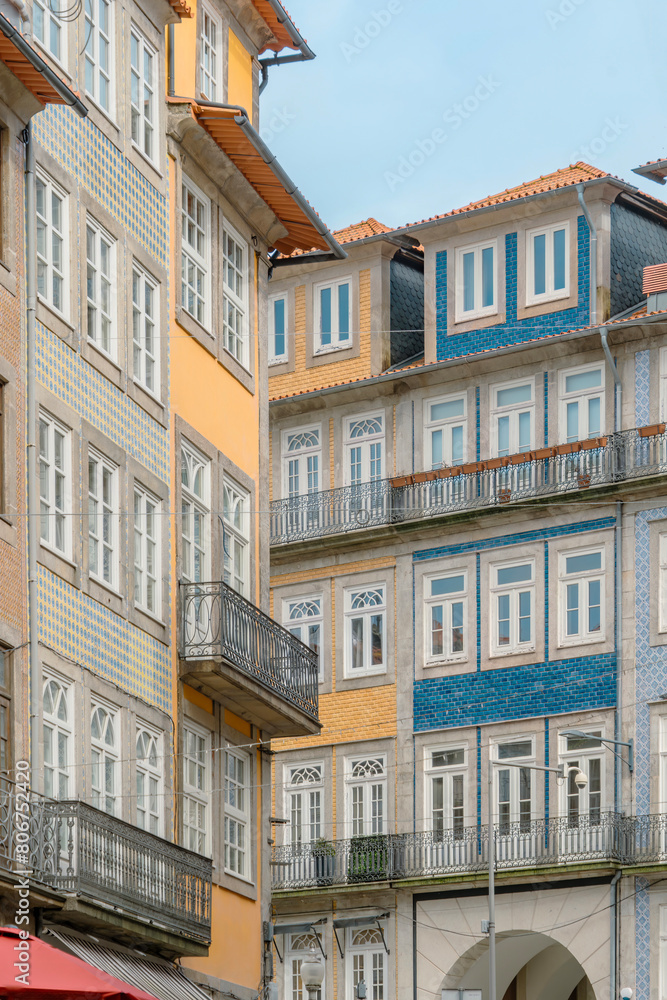 Obraz premium Typical facade of a Portuguese apartment building in the historic center of Porto, Portugal, Europe.