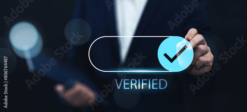 Business technology verification guaranteed good quality service, online trusted application software website digital internet application. Businessman with pen and checked mark.