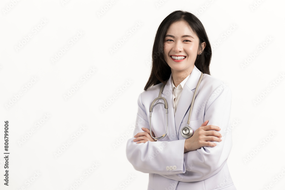 Portrait of happy asian female doctor wearing medical uniform and stethoscope at hospital.Beautiful smiling young asian woman doctor isolated on white background.Doctor arms crossed wear white coat. Portrait of happy asian female doctor wearing medical uniform and stethoscope at hospital.Beautiful smiling young asian woman doctor isolated on white background.Doctor arms crossed wear white coat.