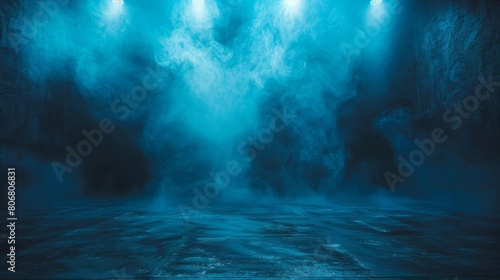 A dark and mysterious room with blue spotlights shining down from the ceiling. The room is filled with thick smoke. © tanapat