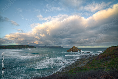 Morning cloudscape over Penafurada on the coast of Loiba photo