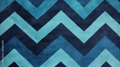 A bold and modern chevron print in vibrant shades of teal and navy blue creating a dynamic and eye-catching design that adds a pop of color and energy to any interior space or fashion ensemble