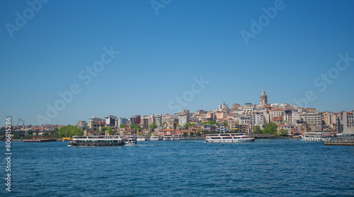 Wallpaper Mural Touristic sightseeing ships in Golden Horn bay against blue sky and clouds. Istanbul, Turkey. During sunny summer day. Torontodigital.ca