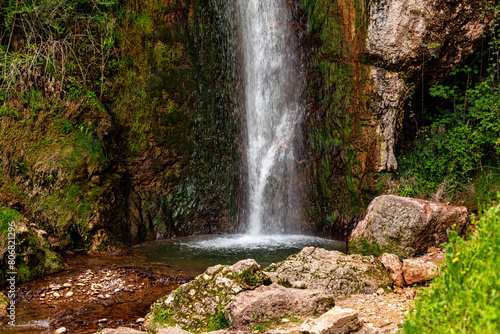 Italian Waterfall in a natural park - Cascata Verde. Parco delle Cascate  Italy  natural park in Molina village  Garda lake  Italy.