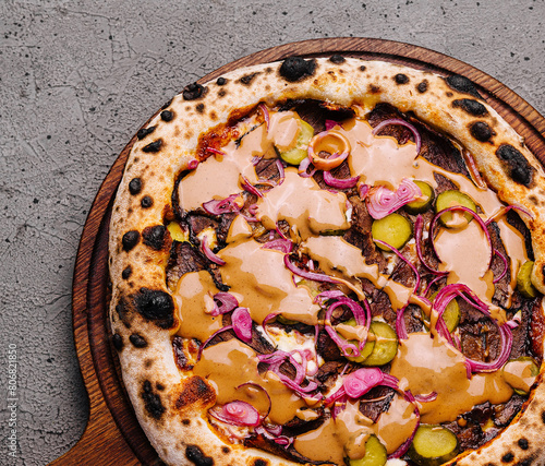 Gourmet vegan pizza on rustic table