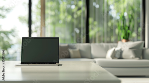 Wallpaper Mural Laptop on work desk with blurred contemporary living room background Torontodigital.ca