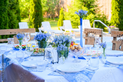 Table decor in shades of blue with Veronica of Austria flowers