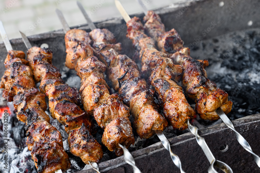 Cooking shish kebab on a charcoal grill
