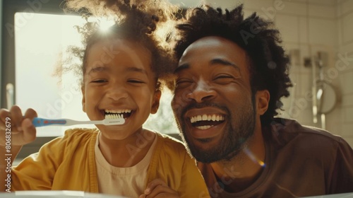 Joyful Father and Daughter Brushing Teeth