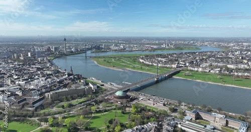 The city skyline of Dusseldorf, Germany. City skyline, tv tower, rheinknie bridge, Rhine river and urban infrastructure. Buildings and housing. Birds eye view. photo