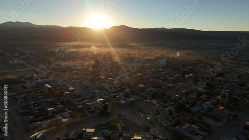 Uyuni salt flats town city drone aerial view bolivia south america Train Cemetery sunrise photo