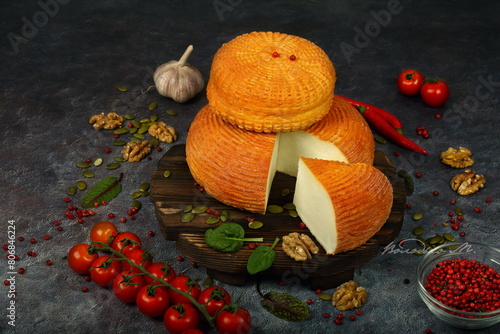 Smoked cheese on black background