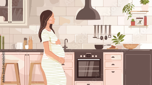 Young pregnant woman suffering from toxicosis in kitchen photo
