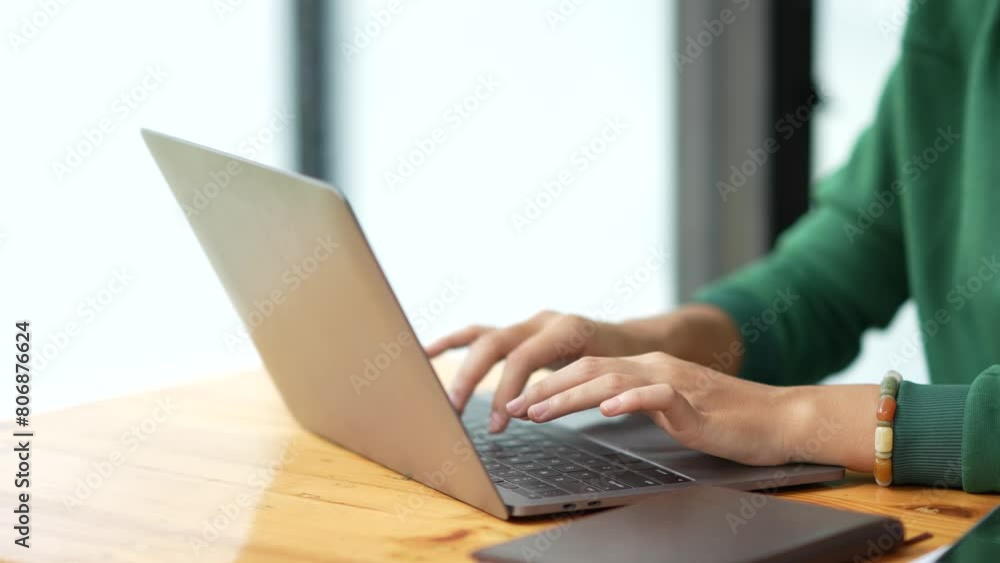 Business Woman hands typing on laptop computer. Focused female Typing on Laptop Computer in Modern Office. Successful Online Work and Digital Communication Business Woman hands typing on laptop computer. Focused female Typing on Laptop Computer in Modern Office. Successful Online Work and Digital Communication