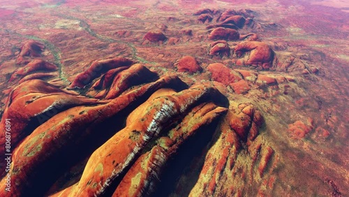 Aerial view of Kata Tju·πØa also known as The Olgas is a group of large domed rock formations or bornhardts located about 360 kilometers southwest of Alice Springs 4k high resolution animation