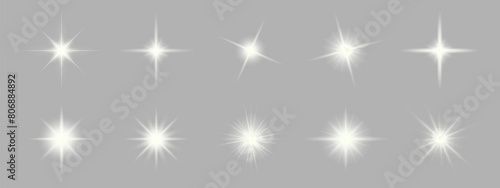 Set of sparkling stars on transparent background. Glow effect. Christmas concept. Festive lights. PNG image