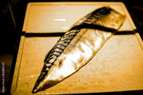 a piece of dried mackerel, which is meticulously prepared
