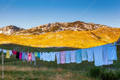 Clean clothes hanging on washing line.