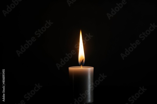 Black background with white thin wax candle with a small lit flame for funeral grief death dead sad emotion with copy space texture for display 