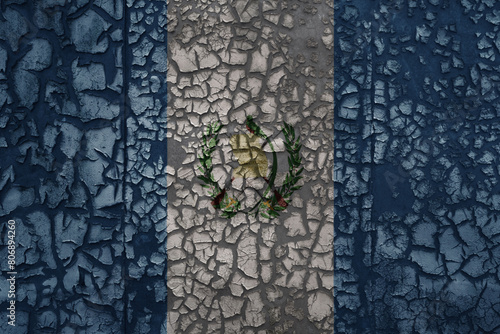 flag of guatemala on a old grunge metal rusty cracked wall background photo