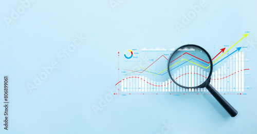 Magnifying Glass Focused on Positive Economic Growth, Unveiling Opportunities for Success idea for business,financial,Management, Economic,investment. photo