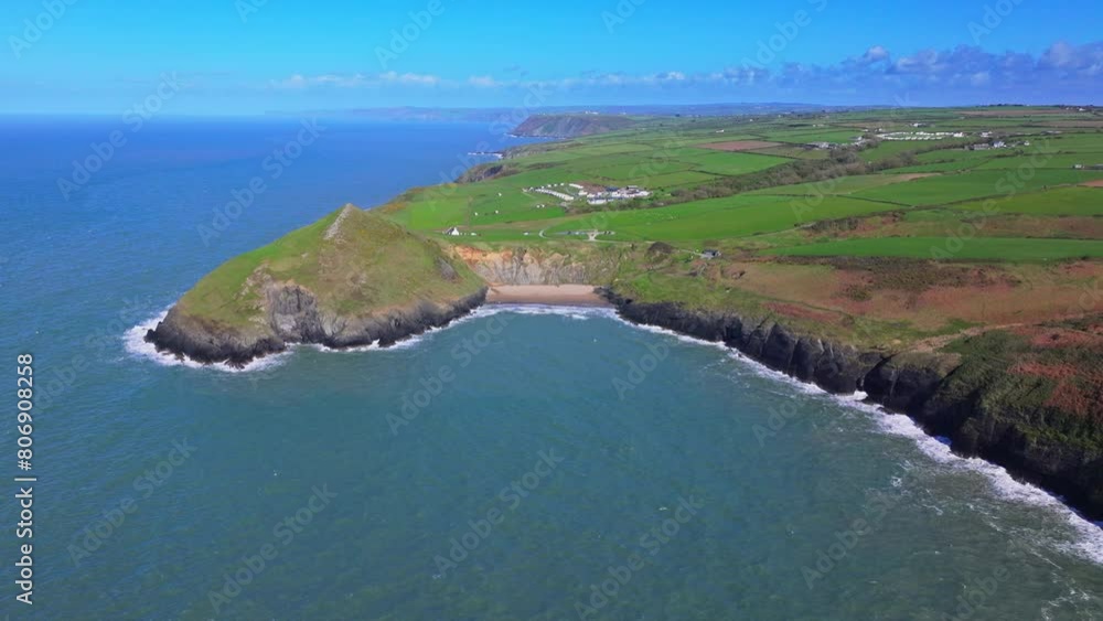 Aerial shot of Welsh coastline and Mwnt promonontry with beach Aerial shot of Welsh coastline and Mwnt promonontry with beach