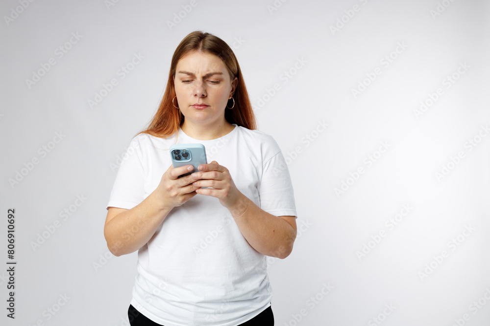 Upset sad woman use smartphone browsing, play game, loses, surprised by sudden lottery results bad fortune loss fail unlucky news, studio portrait. Upset sad woman use smartphone browsing, play game, loses, surprised by sudden lottery results bad fortune loss fail unlucky news, studio portrait.