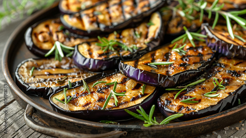 Platter of grilled eggplant with rosemary