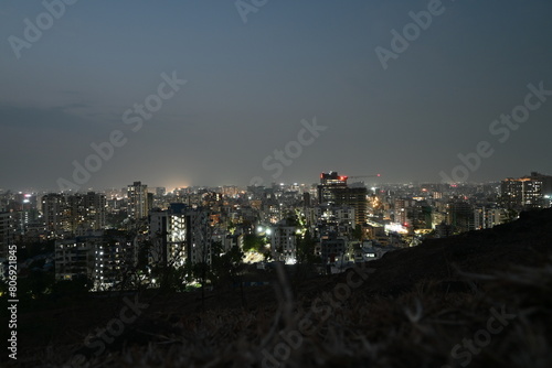 View of Pune in summer  Cityscape Skyline  buildings holdings  Signboards  and banners  Pune  Maharashtra  India